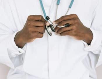 Person-holding-a-stethoscope