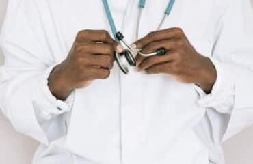 Person-holding-a-stethoscope