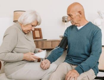 Woman-Checking-Blood-Pressure-of-a-Man